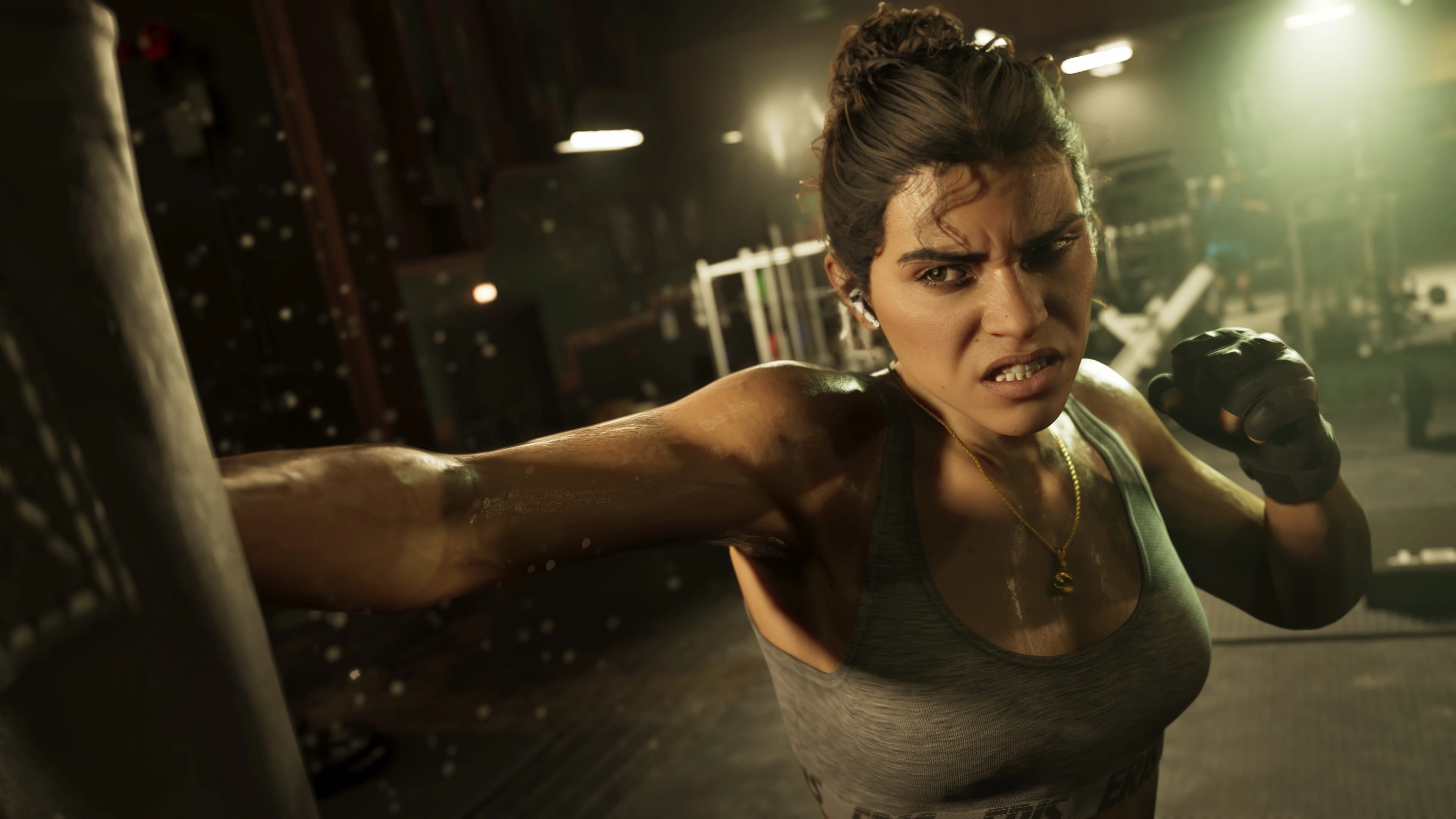 GTA 6 protagonist Lucia Caminos trains with a punching bag inside a gritty Vice City gym.